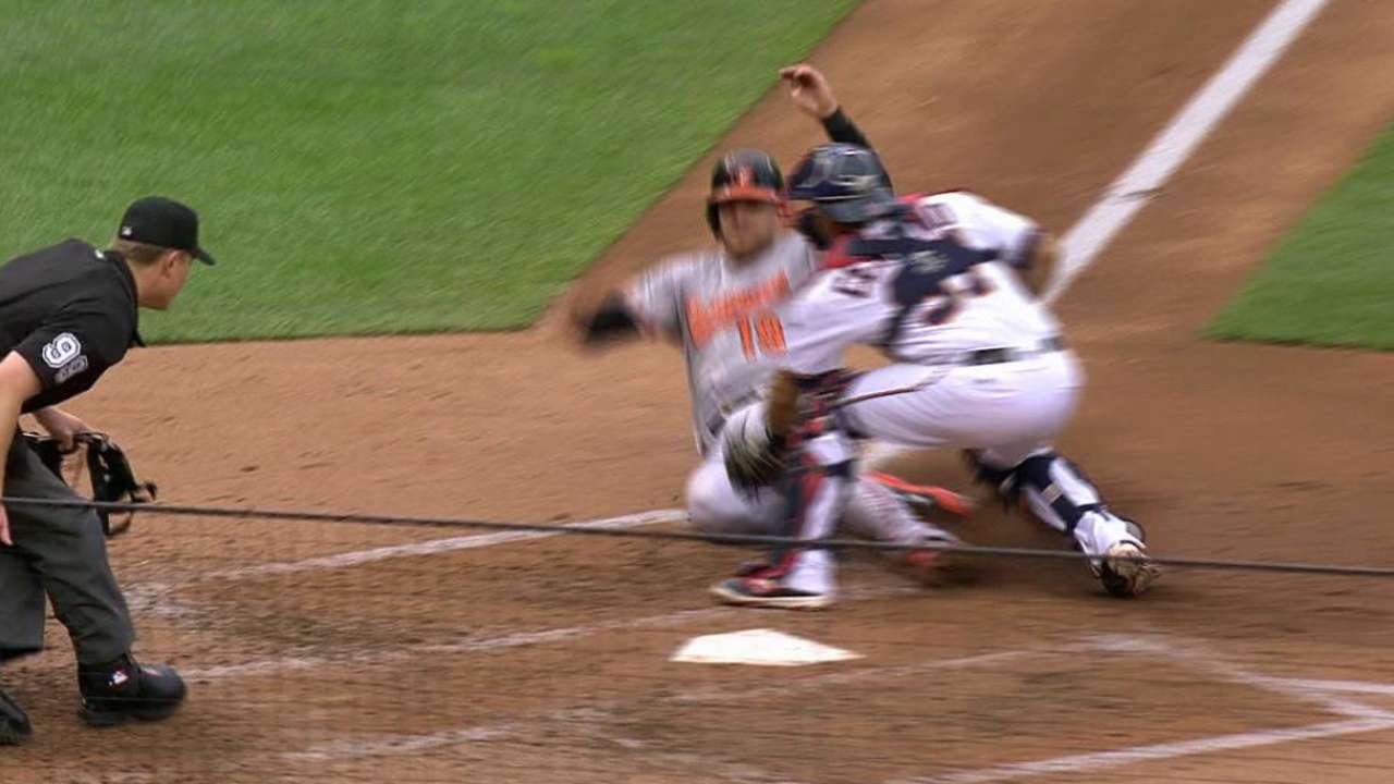 Escobar nabs Davis at the plate