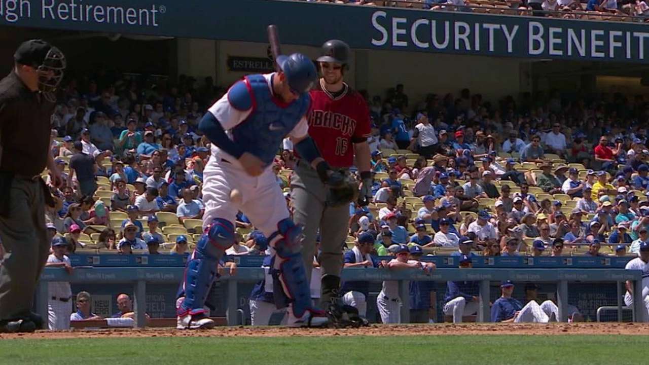 Ball lodges into Grandal's gear
