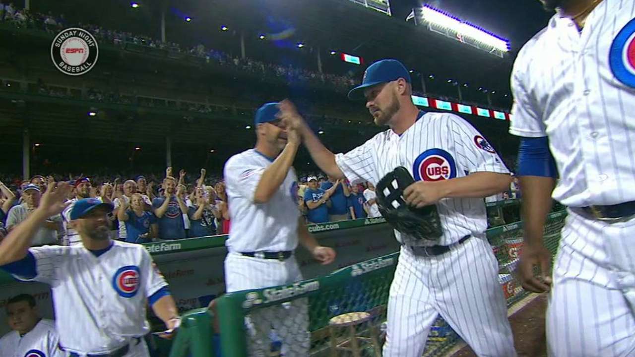 Wood greeted by teammates