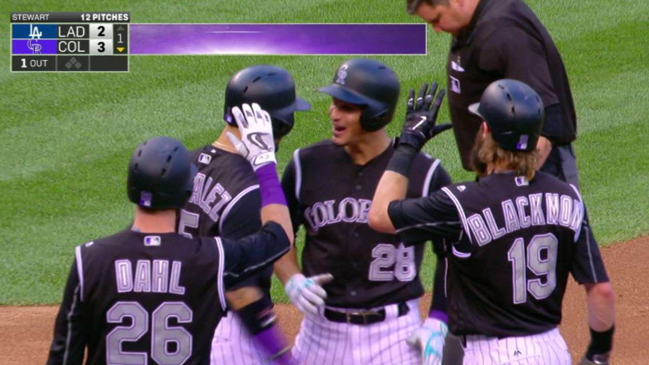 Arenado ignites Rox by ending homer drought