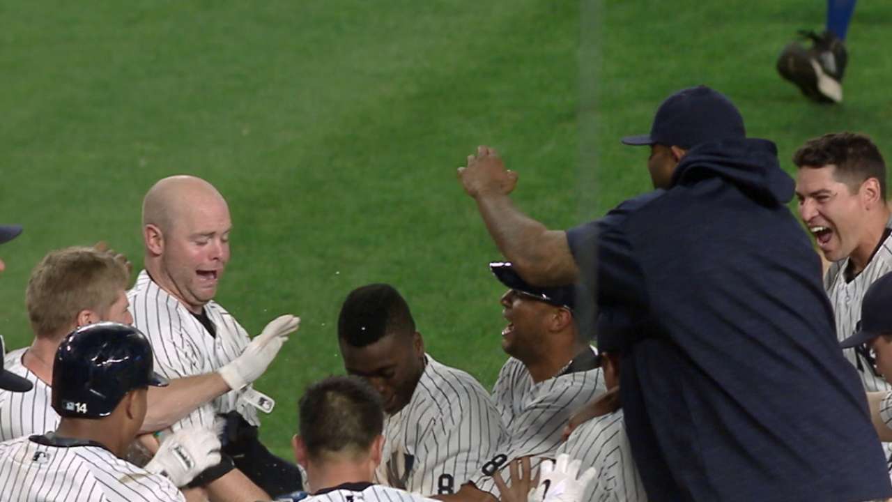Power rally: Yanks walk off with 6 in 9th