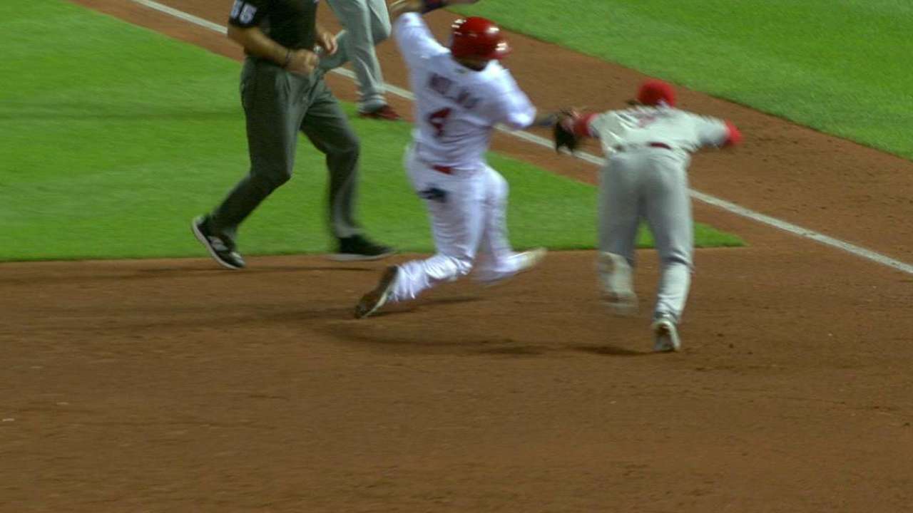 Molina ruled safe at third