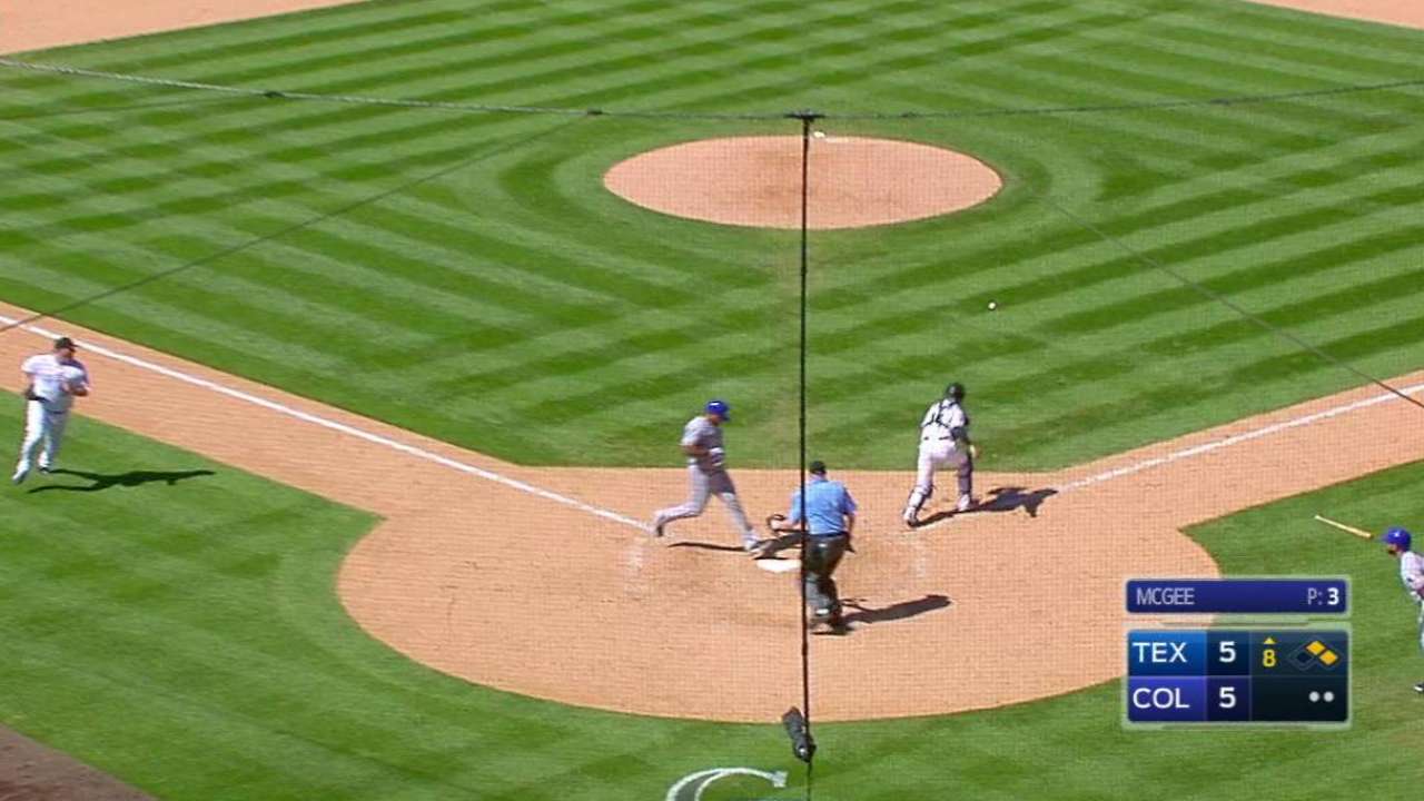 Rangers tap Rockies with another late rally