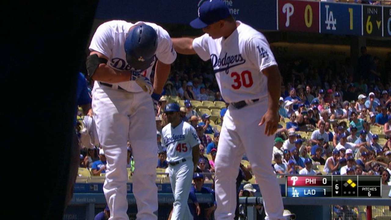 Seager hit by a pitch, stays in