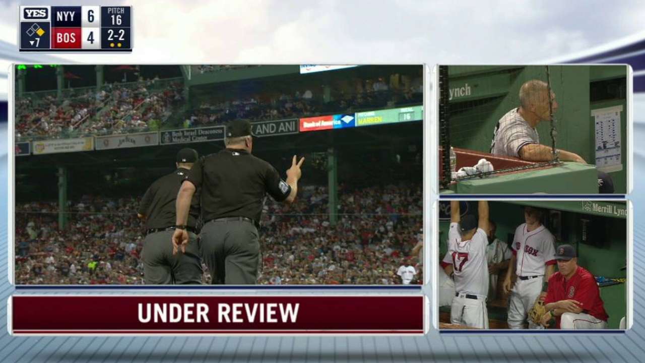 Umpires review the count in 7th