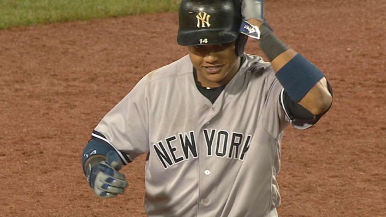 Inspired by bullpen, Yanks rally to deny Sox