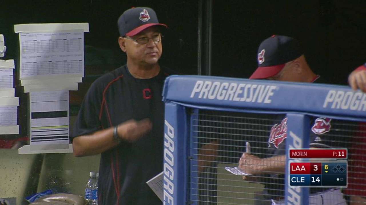 Santana hurt by hard foul into Indians dugout
