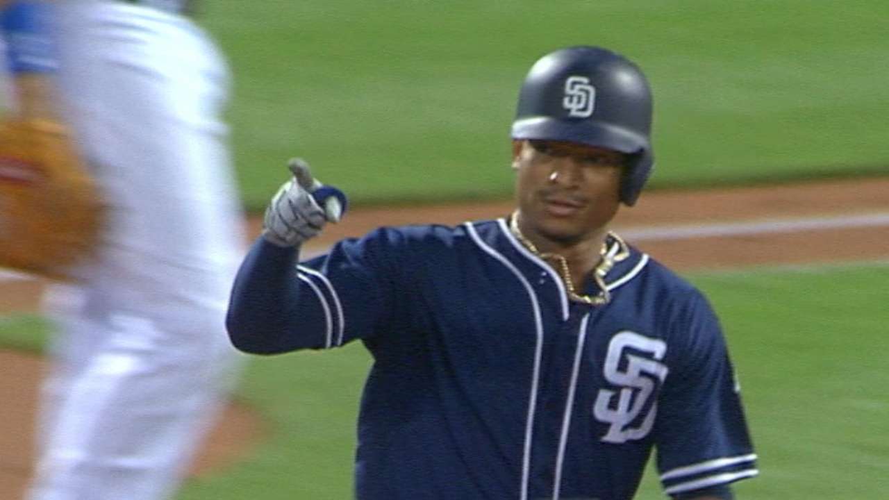 Padres power up, hold off rally to top Mets