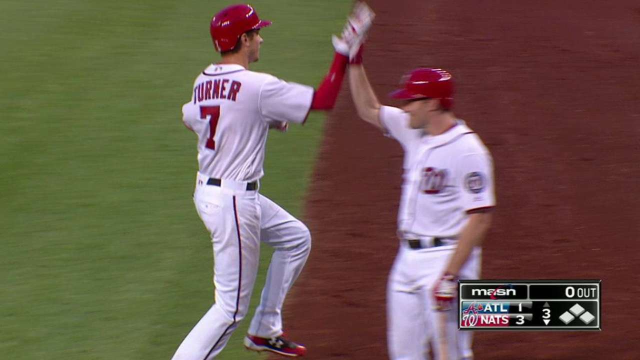Nats hold off Braves for Lopez's 1st MLB win