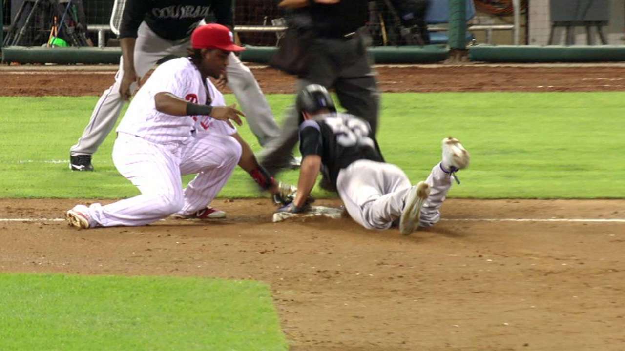 Rusin fills in effectively on mound, at plate