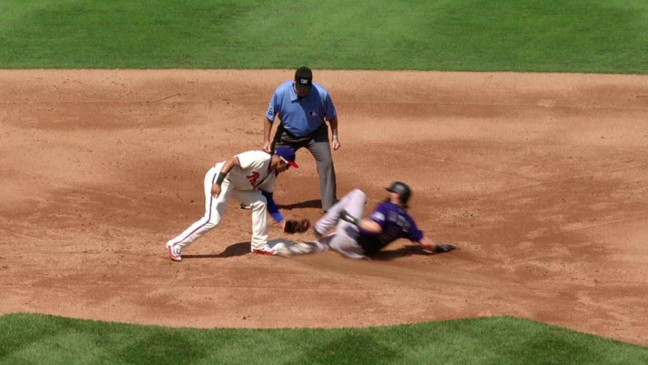 Blackmon's slick slide avoids tag, creates run