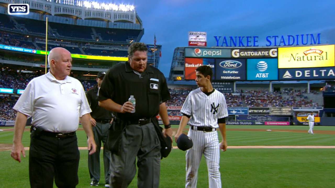 Home-plate umpire exits Jays-Yanks game