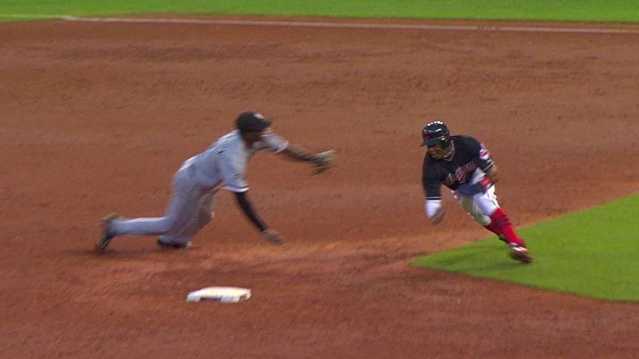 Davis avoids the tag
