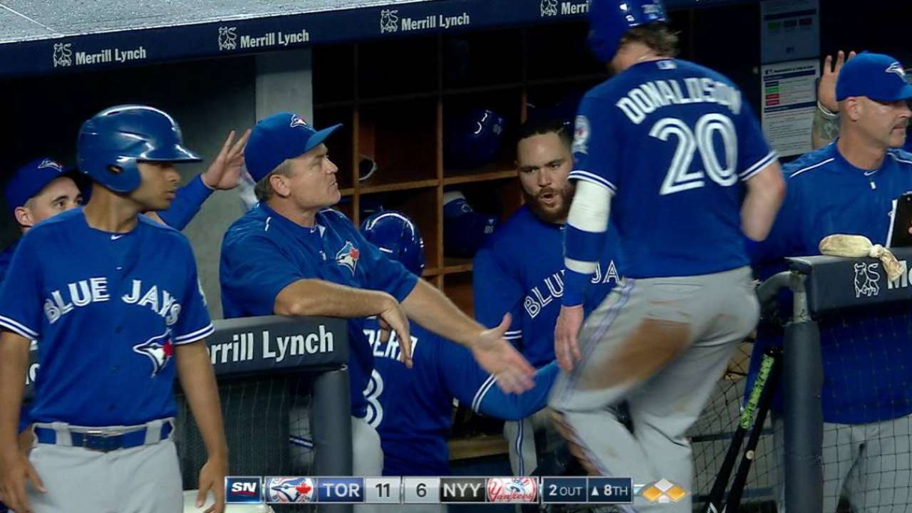 3-RBI night puts Encarnacion 1st to 100 RBIs