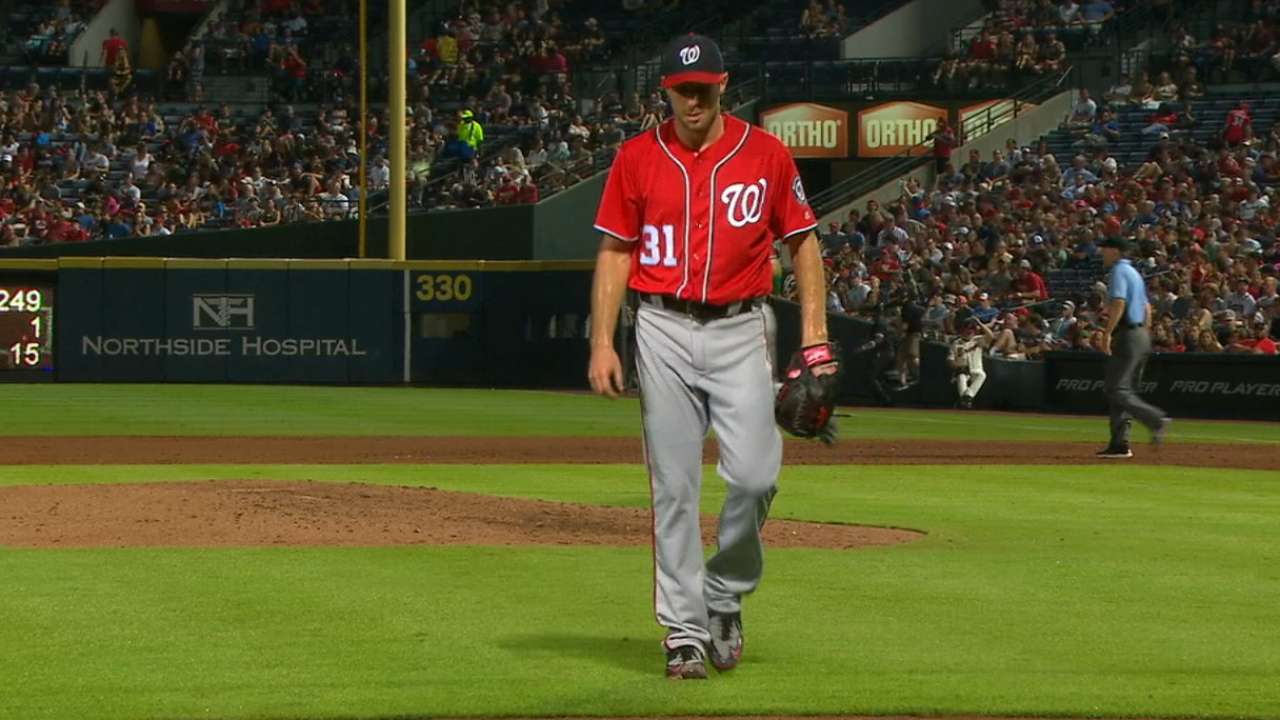 Scherzer collects 2 hits, settles down in win over Braves