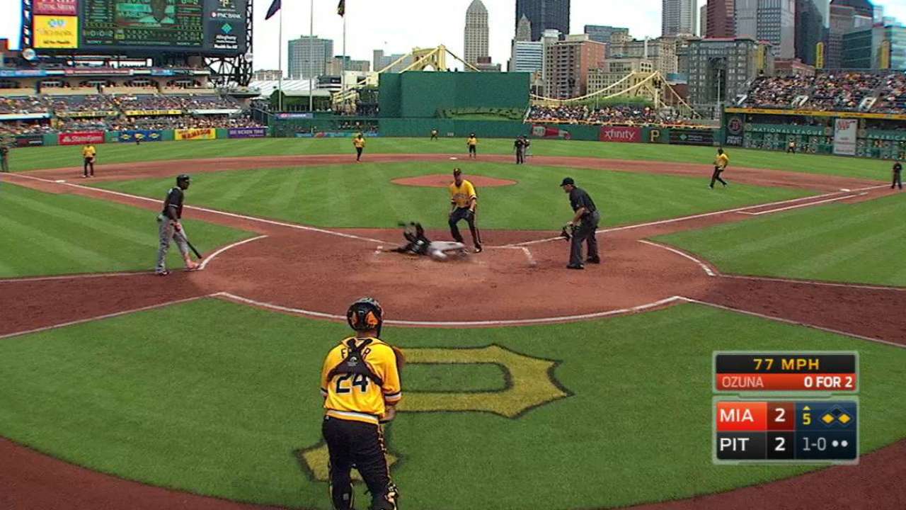 Gordon scores on a wild pitch