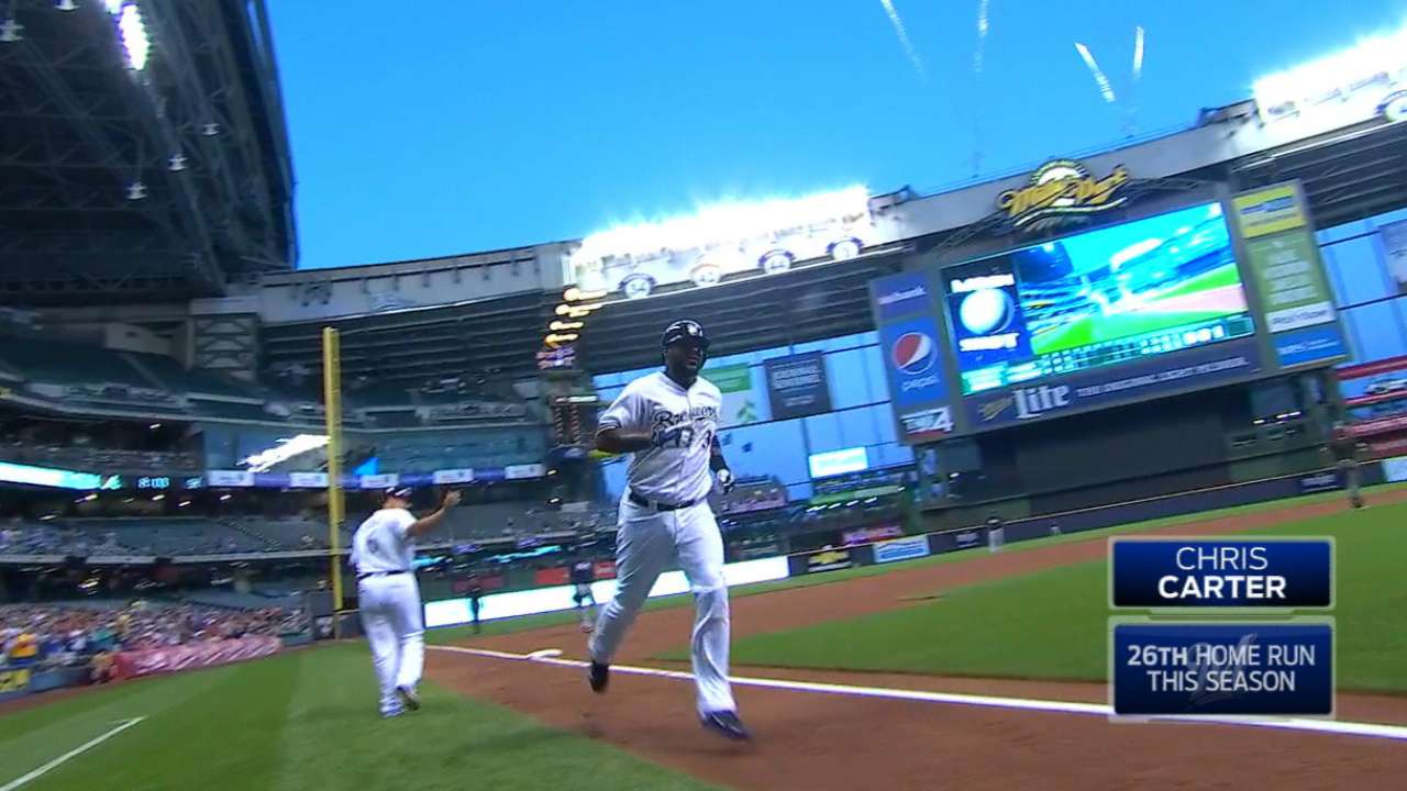 Carter's blast leads Crew over Braves