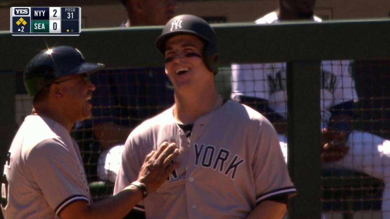 Yanks overpower Mariners with youth, years