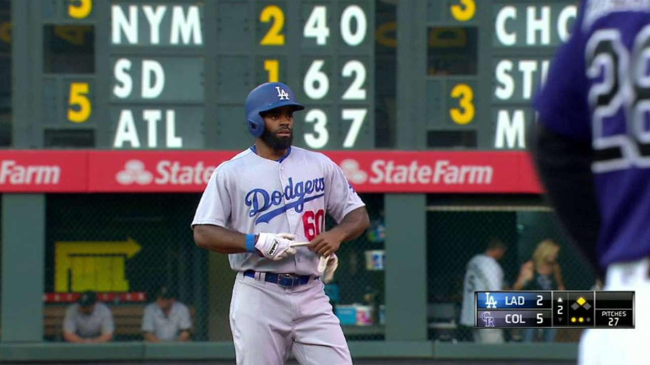 Toles drives in Grandal