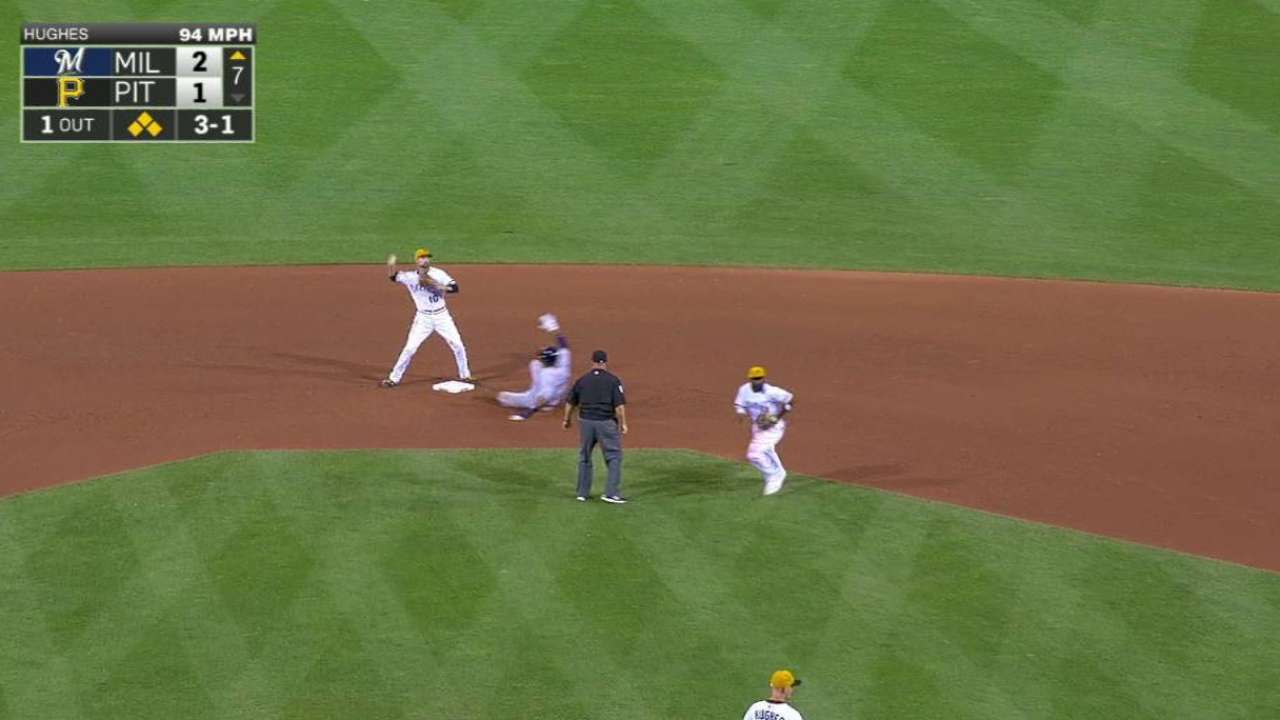 Hughes escapes bases-loaded jam