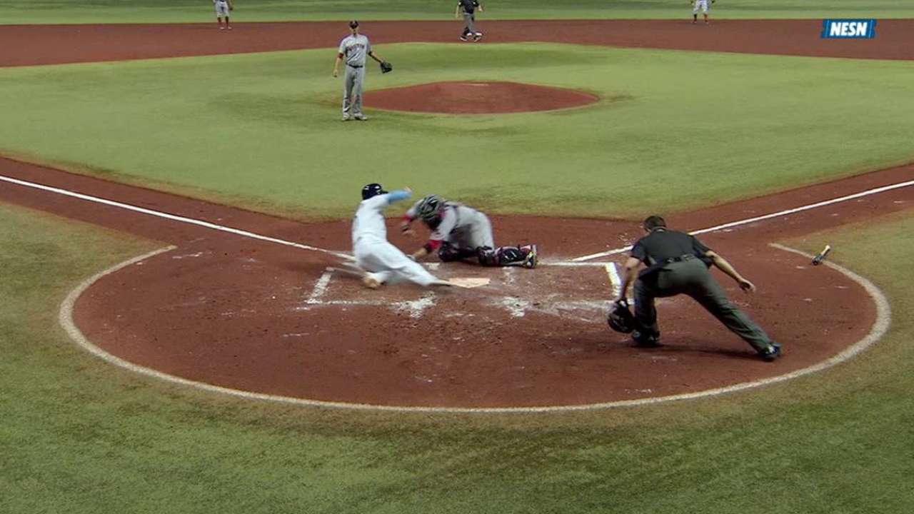 Pedroia stops a run from scoring