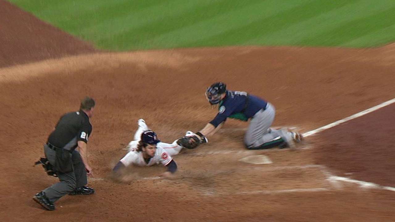 Marisnick avoids tag at home