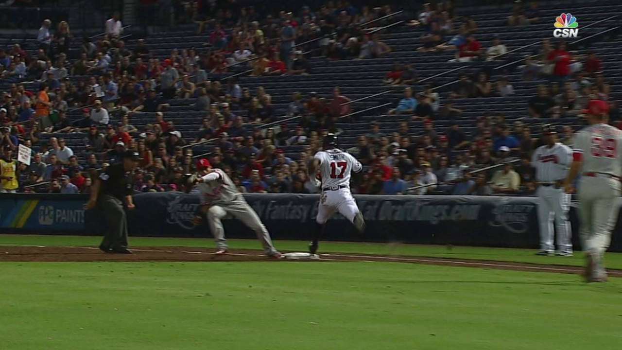 Morgan gets the out at first