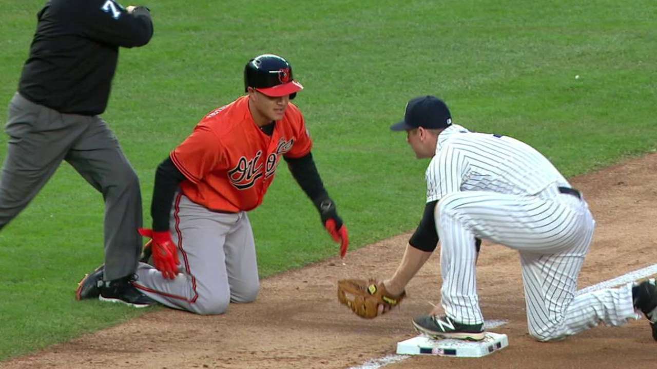Refsnyder nabs Machado at third