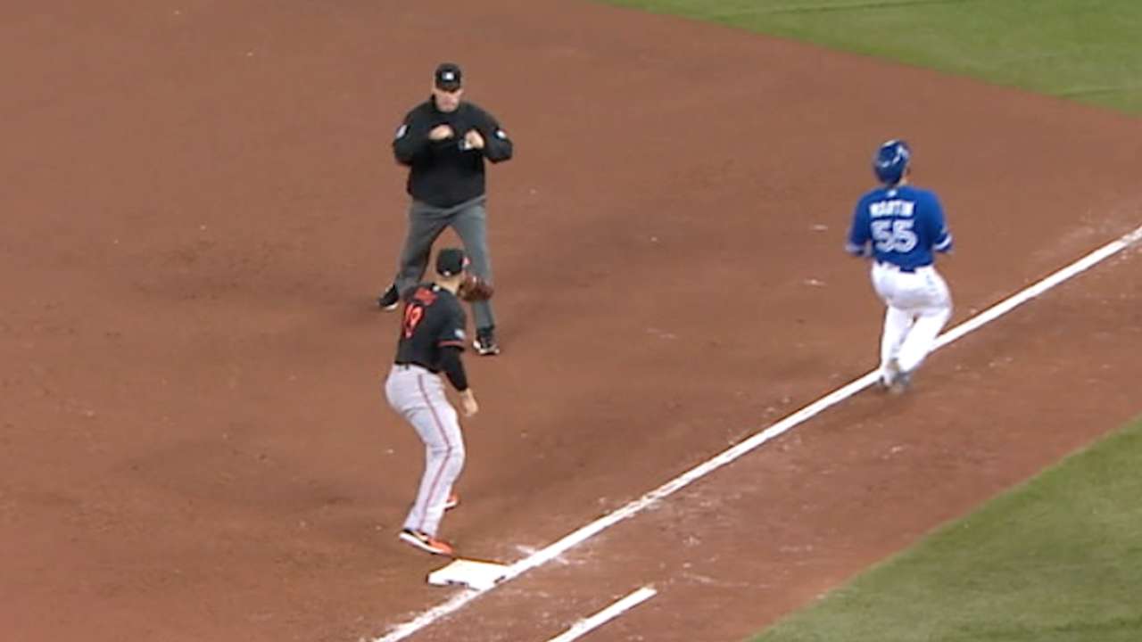 Orioles escape jam in 9th