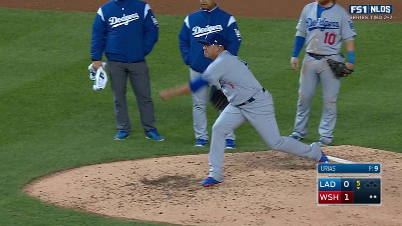 Urias checked on, stays in game