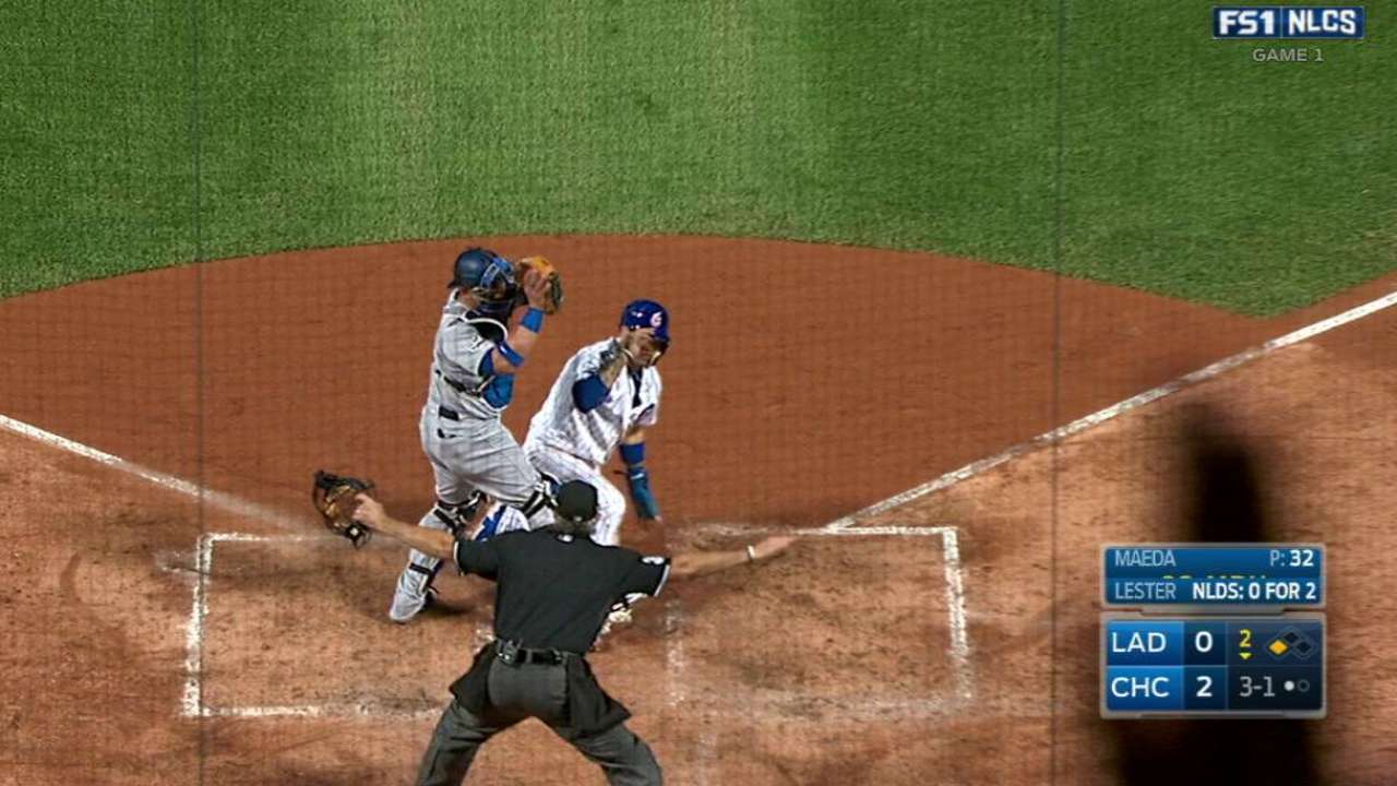 Baez swipes home to extend lead