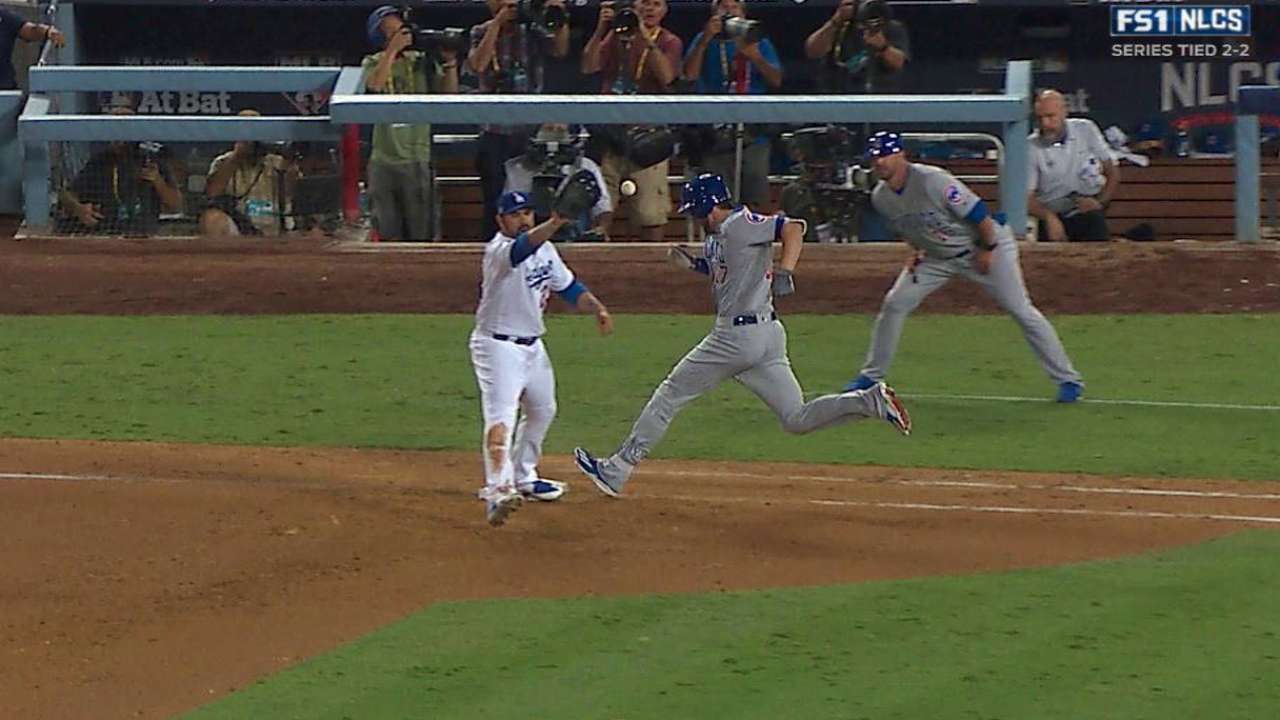 Bryant reaches, call confirmed