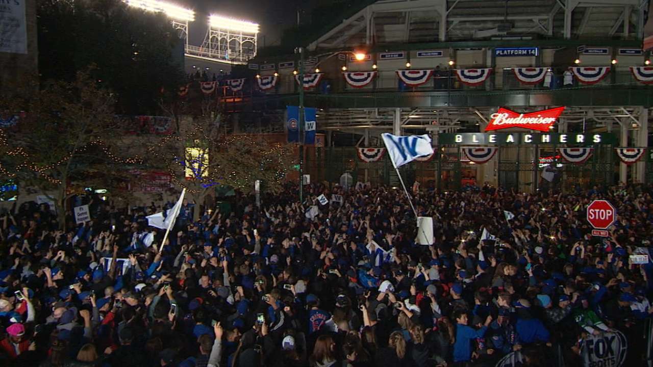 Fans celebrate outside Wrigley