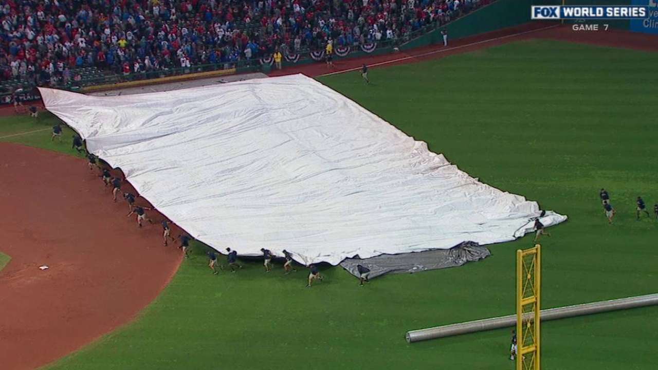 Tarp comes onto the field