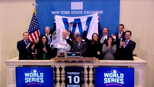 The Commissioner's Trophy visited Wall Street to help ring ...