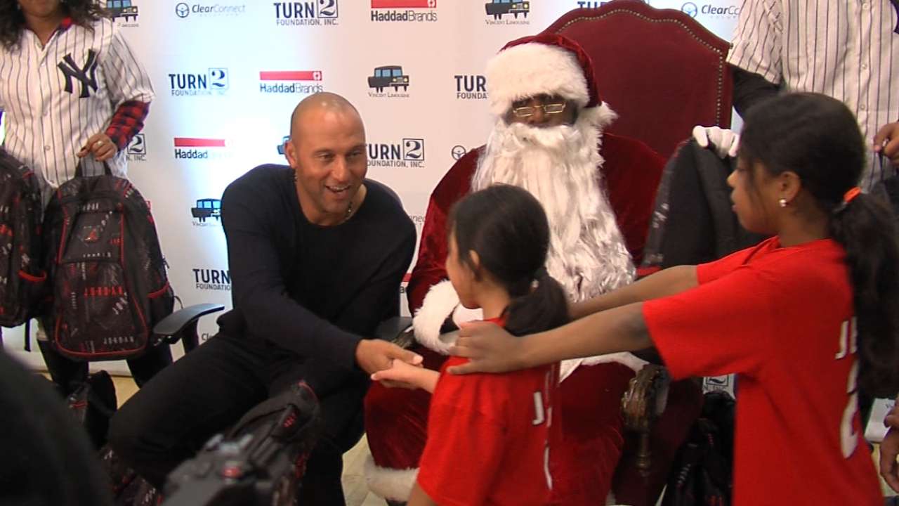 Jeter hands out gifts to kids
