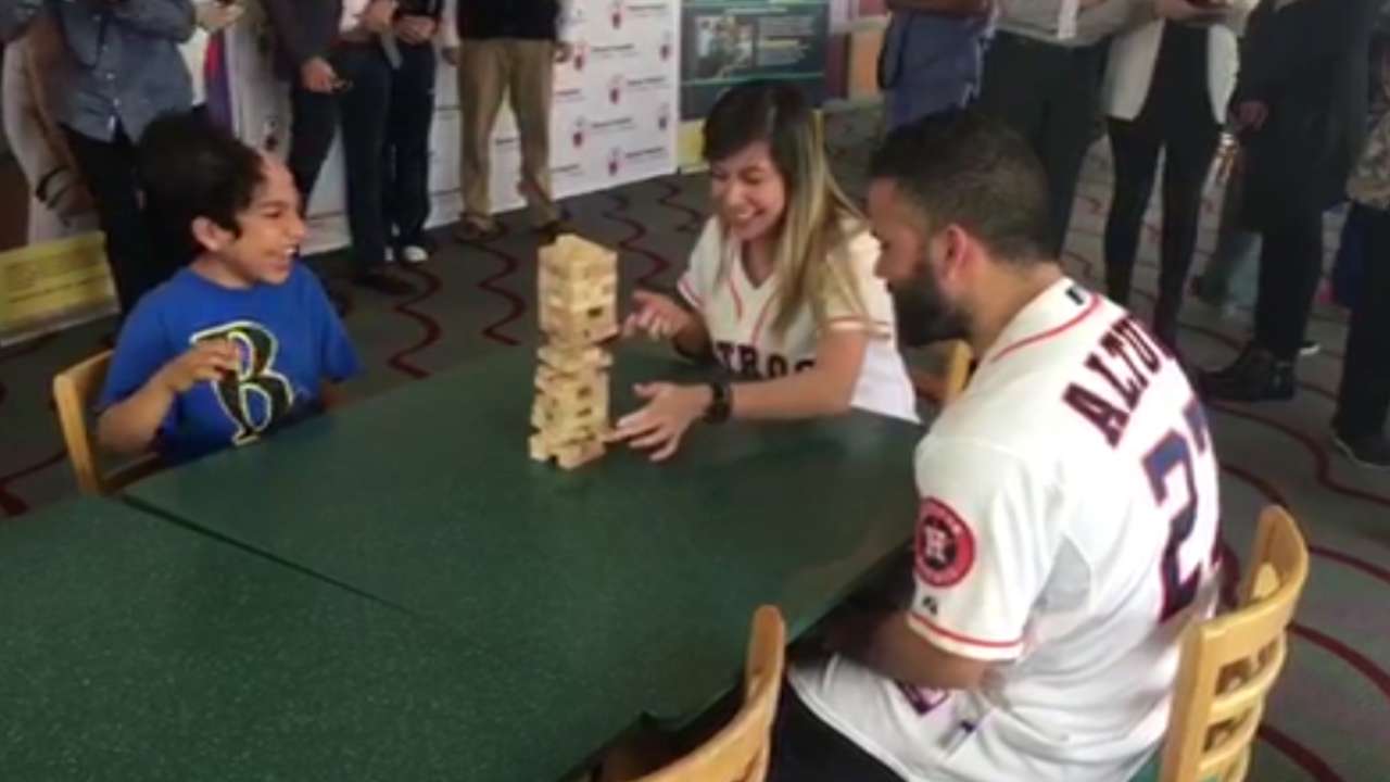Astros lose games, win smiles at children's hospital