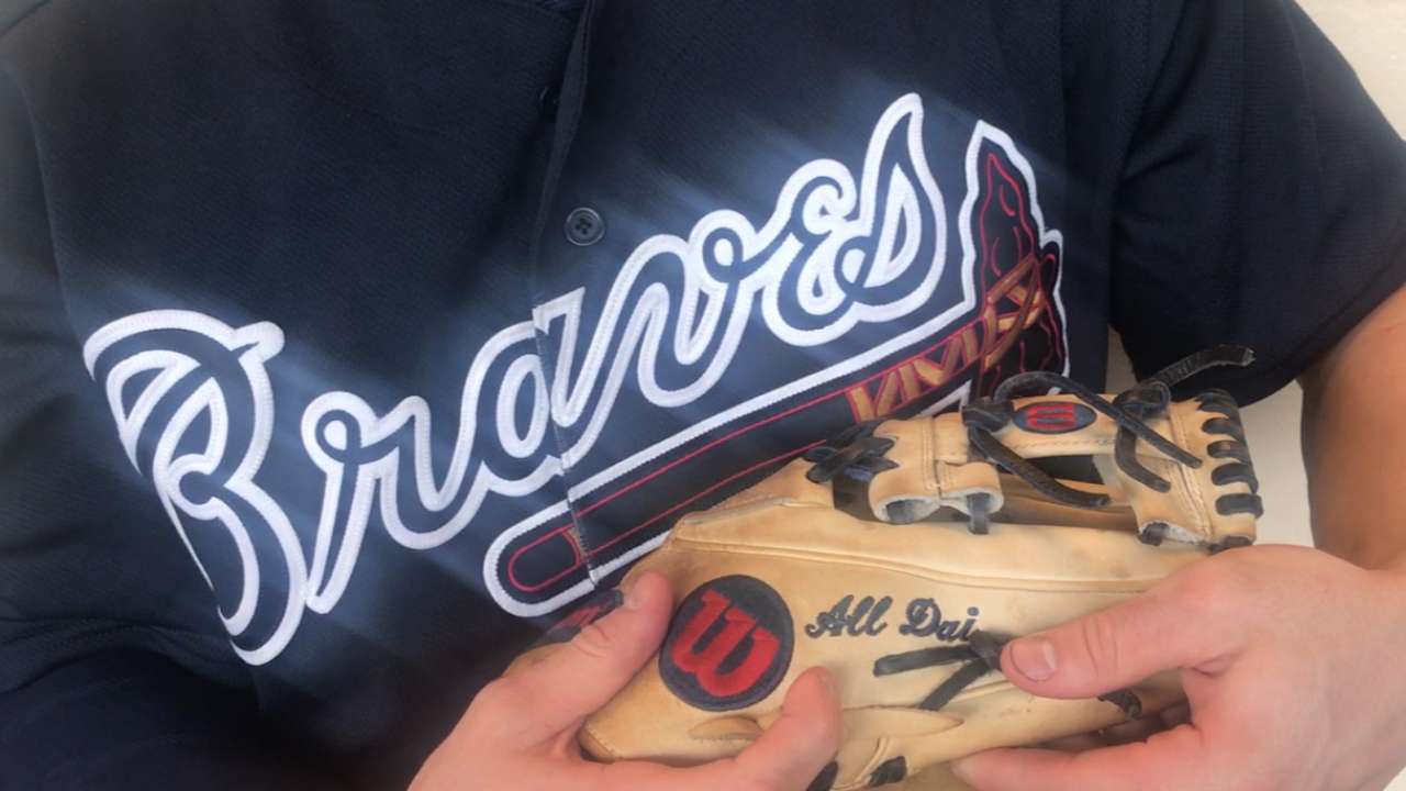 Swanson gets custom glove to honor fallen friend
