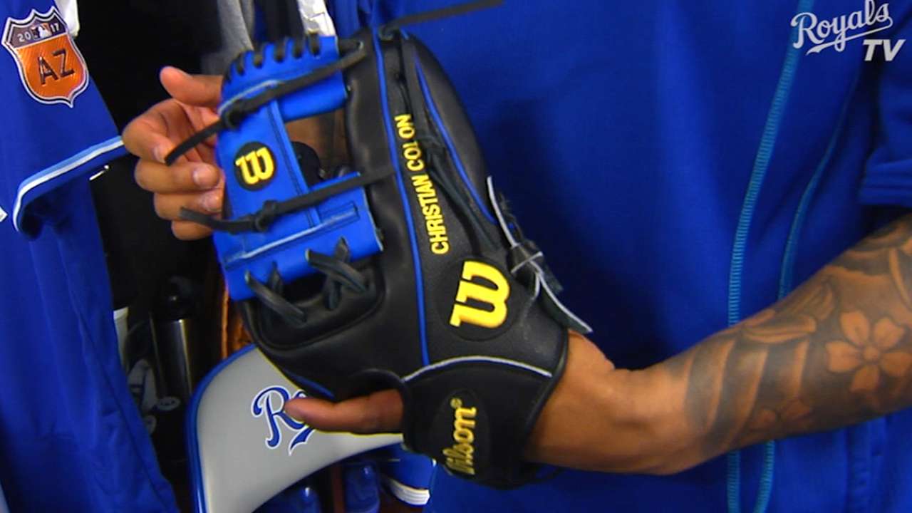 Colon shows off new glove