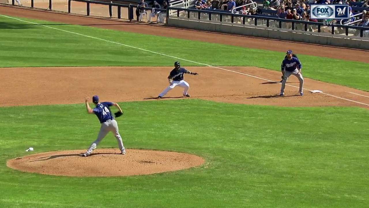 Hill goes 2 scoreless in spring debut vs. Crew