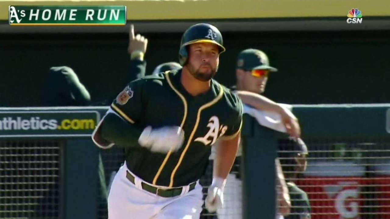 Alonso's homer leads A's late rally