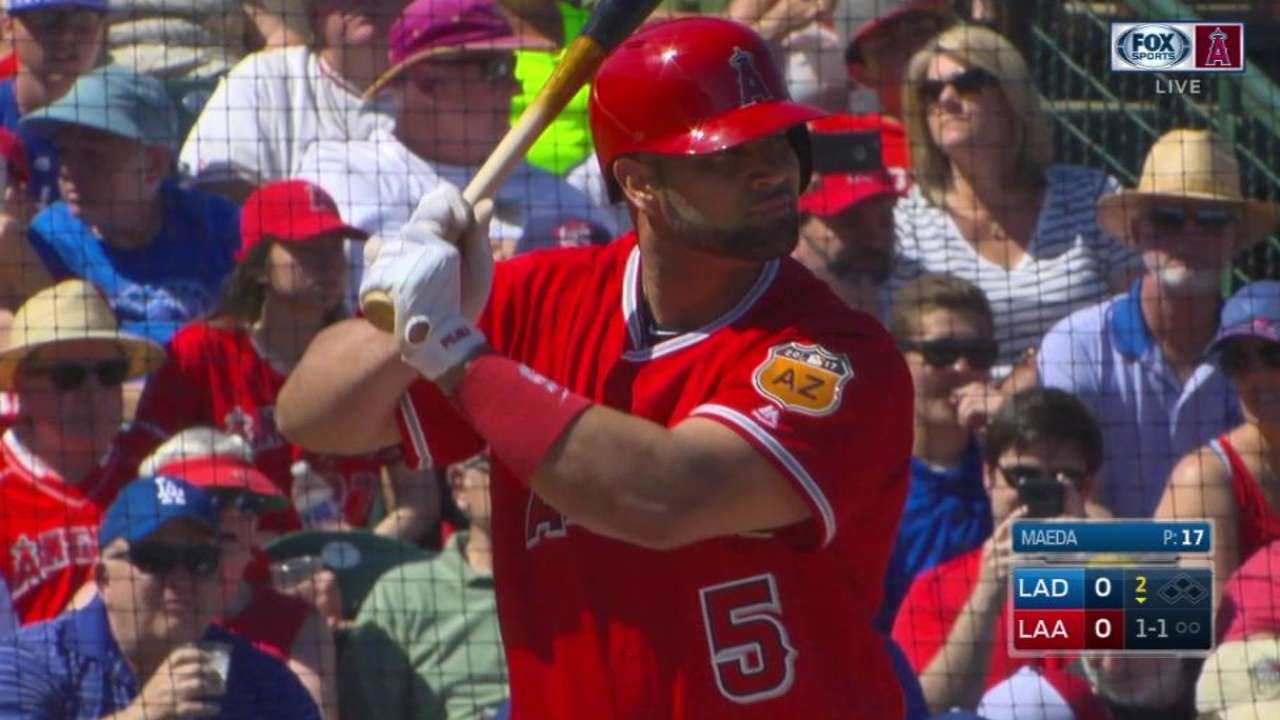 Pujols wastes no time warming up boomstick
