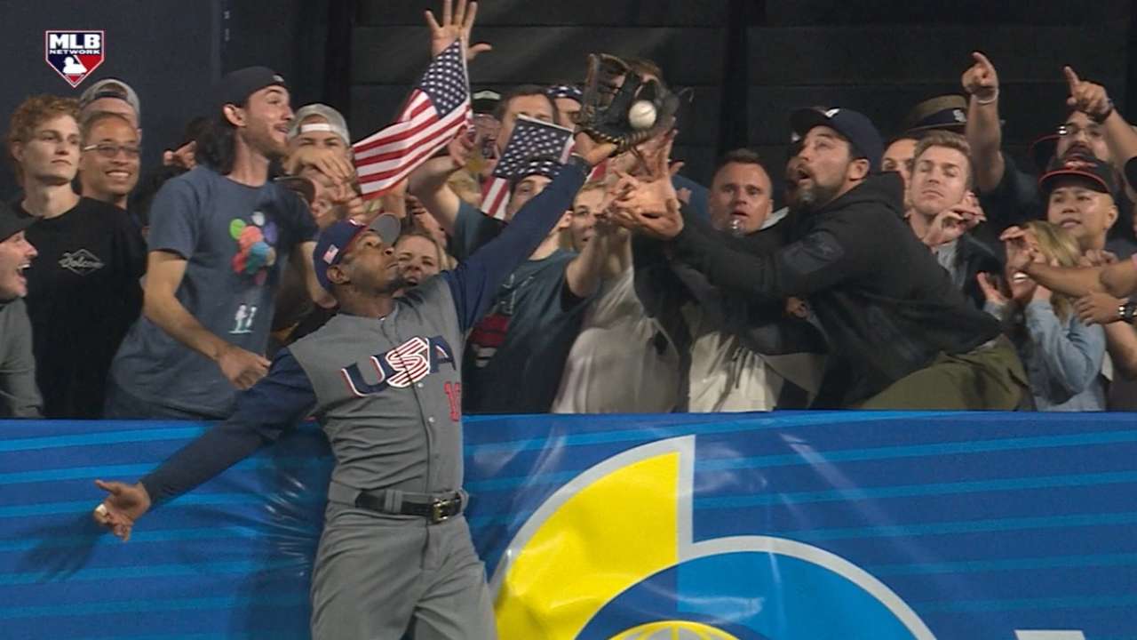 Jones robs HR, Machado tips cap