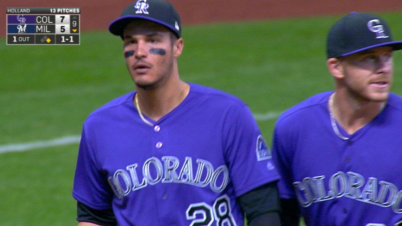 Holland, Arenado end the game