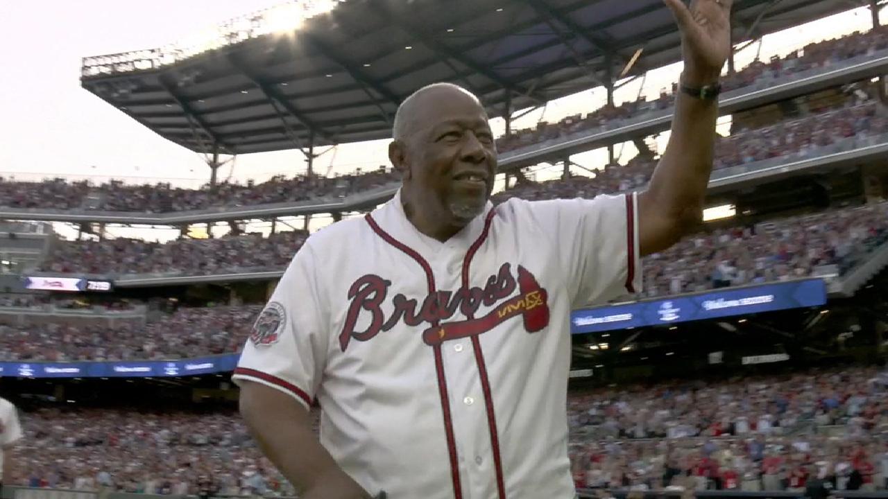 Aaron throws first pitch