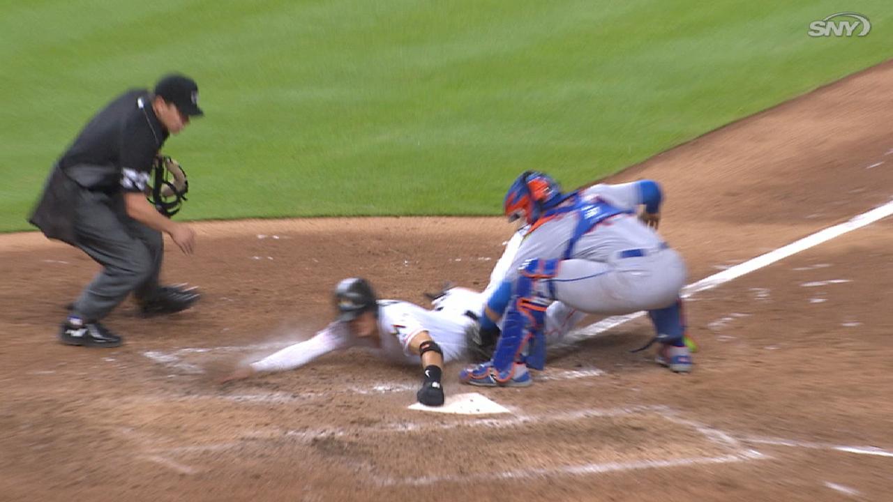 Conforto preserves late tie with throw to plate
