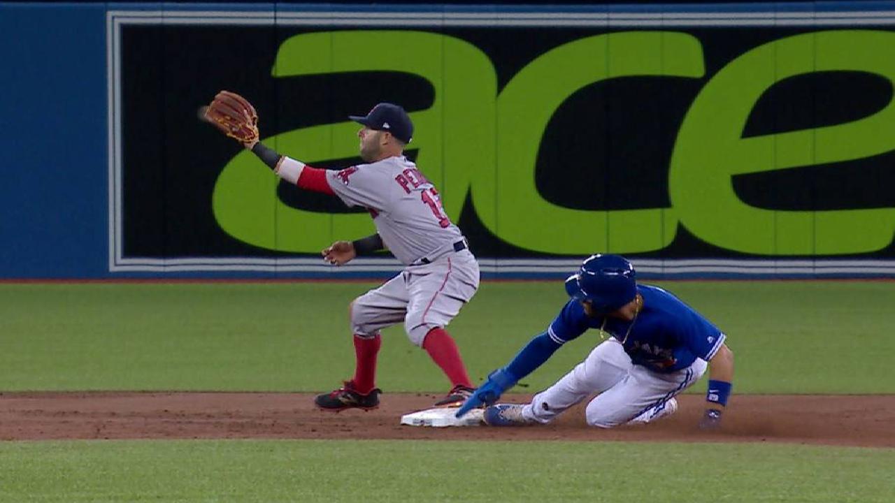 Travis slides safely into second