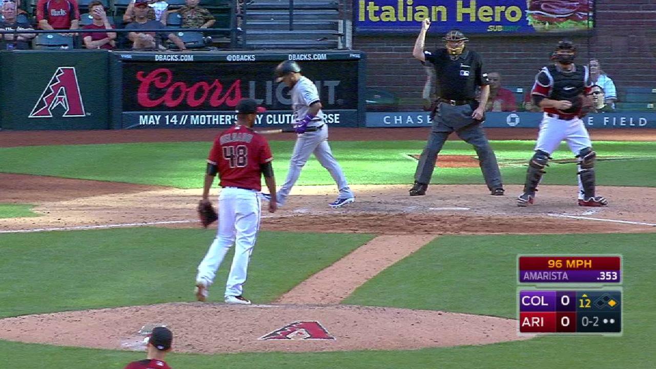 Delgado strikes out the side