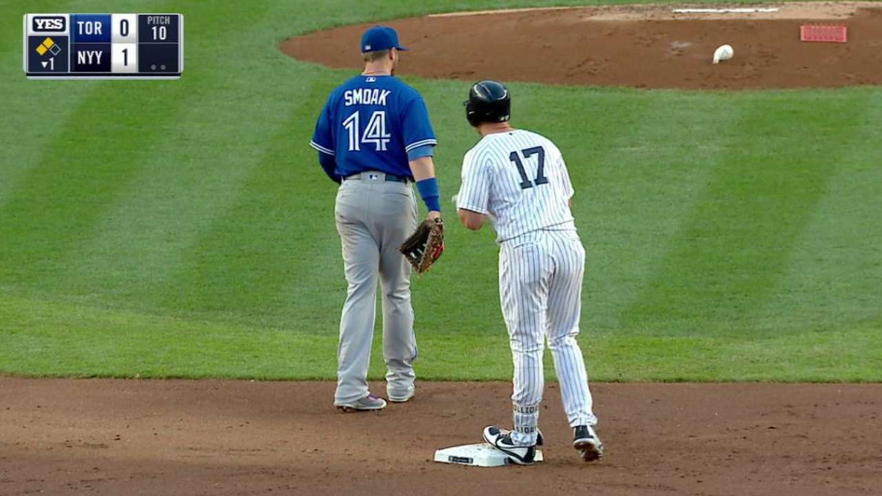 Holliday's RBI double to left