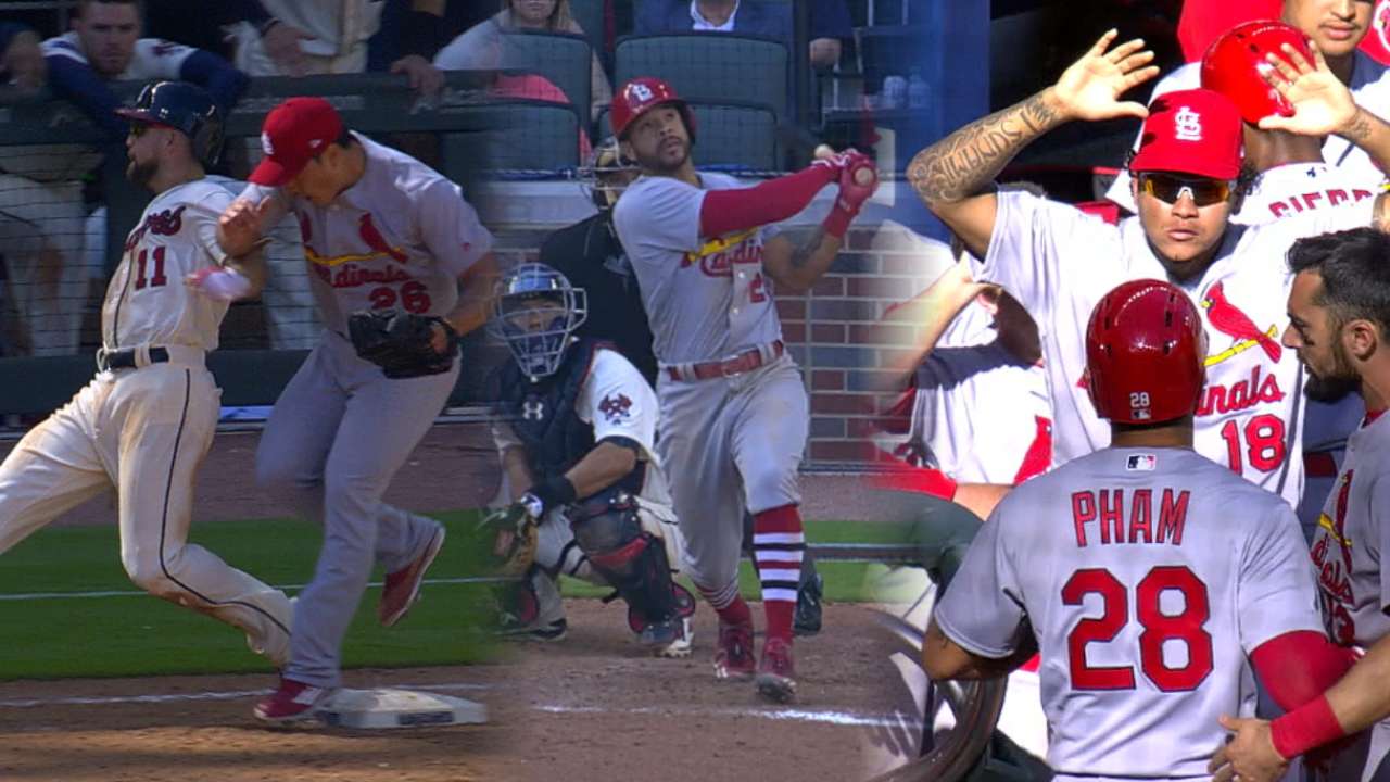 Pham-tastic! Cards win on 14th-inning HR